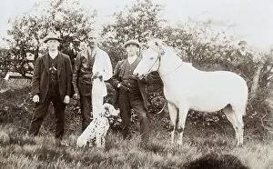 Spotty: Three men with dalmatian and pony