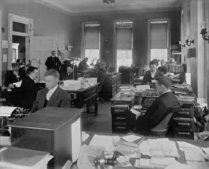Lcgr1703: Men at desks in White House Executive Office, Dec
