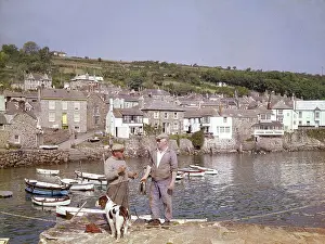 Mousehole: Men, dog and boats at Mousehole, Cornwall