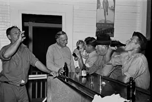 Repealed: Men drinking beer at the bar in Pilottown, ?