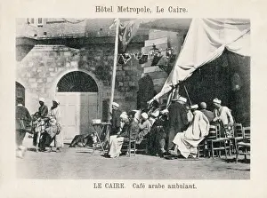 Restaurants: Men drinking coffee at the Metropolitan Hotel, Cairo