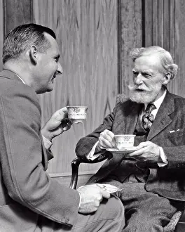 Oldsters: Two men Drinking Cups of Tea or Coffee