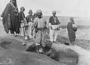 Belonging: Men extracting olive oil, 1932
