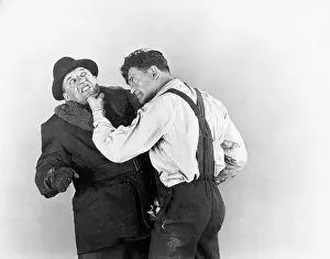 Confronting: Two men fighting with each other