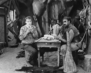 Gamblers: Two men gambling playing cards