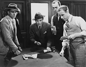 Gamblers: Men gambling playing a craps game