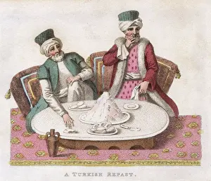 Buns: Two men having a Turkish breakfast of yogurt and buns