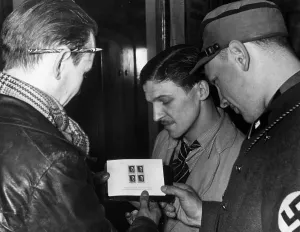 Philately: Men with a Hitler stamp, 1937