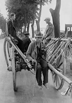 Roam: Men on a horse cart, 1932