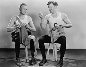 Genders: Two men knitting and sewing
