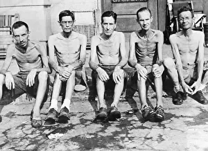 Emaciated: Five men liberated from the Santo Tomas internment