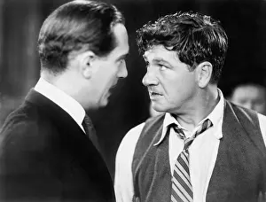Glare: Two men looking angrily at each other