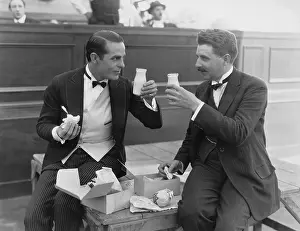 Boxed: Two men making a toast