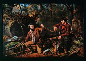 Trapping: Two men mink trapping in the woods, USA