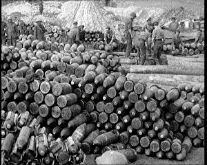 Stockpile: Men Moving Ammunition Around on a Huge Stockpile