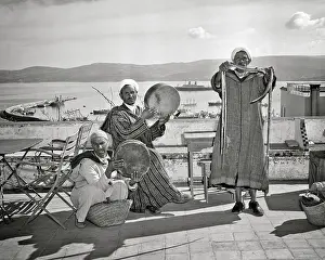 Casbah: Three Men in Native Clothing Two Musician Drummers