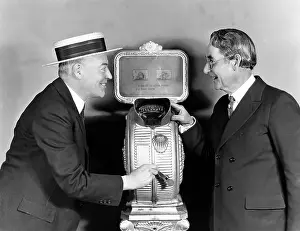 40 45: Two men next to a nickelodeon