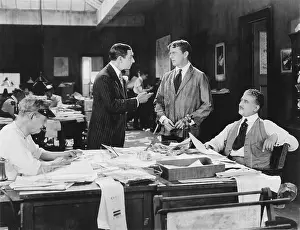 Endeavor: Four men at an office