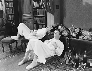 Pajamas: Men passed out with champagne bottles