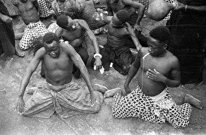 Whistles: Men performing traditional dance - exact location unknown
