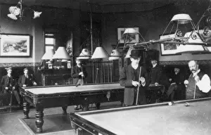 Billiards: Men playing billiards in a club