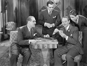 40 45: Four men playing cards