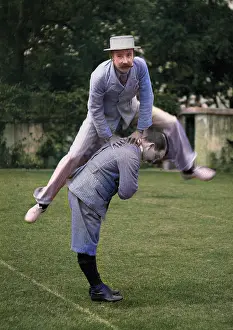 Leapfrog: Two men playing leapfrog