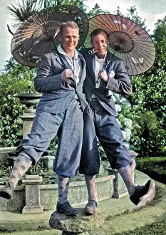 Breeks: Two men in plus fours, holding parasols