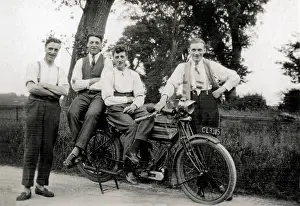 Garters: Men pose with 1914/15 Triumph motorcycle
