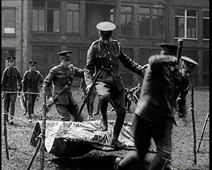 Practising: Men Practising Crossing Barbed Wire. They Are