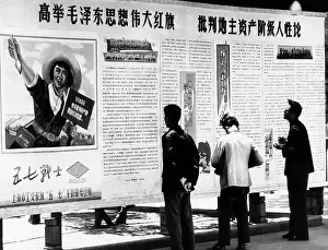 Exhortation: Men reading at a bill board newspaper in ?