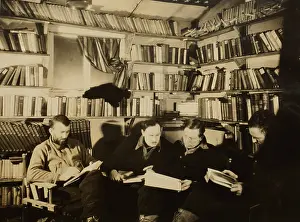 Lcgr1802: Men reading in Byrds First Antarctic Expedition