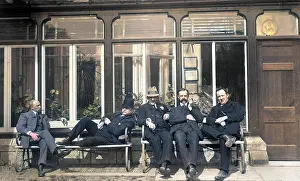 Moorfield: Five men relaxing on a bench