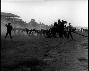 Jumps: Men Riding Cavalry Horses in a Simple Race
