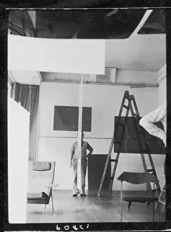 Stepladder: Men setting up an exhibition, ICA, London