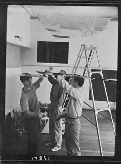 Stepladder: Men setting up an exhibition, ICA, London