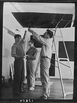 Stepladder: Men setting up an exhibition, ICA, London
