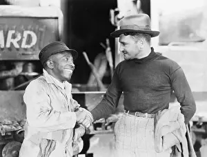 Accord: Two men shaking hands with each other