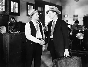Accord: Two men shaking hands in a car shop