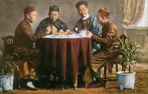 Scholarly: Four men share a meal, China
