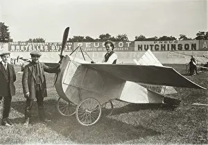 Man Powered: Men Standing and Pilot Sitting in the Cockpit of an Airc?