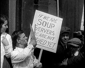 Strikers: Men Strikers Holding A Placard Reading If