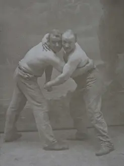 Pauli: Two men stripped to the waist - in