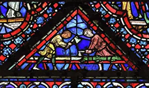 Stripping: Men stripping a tree, donor window of the woodworkers