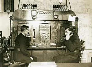 Watchroom: Two men on switchboard at LFB HQ