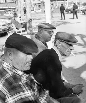Boules: Men watching game of boules, Le Lavandou, South of France