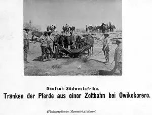 Southwest: Men water horses, 1918