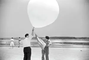 Caucasian Ethnicity: Men - weather balloons - data - science - instruments