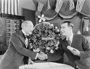 Grasp: Men wishing each other good luck