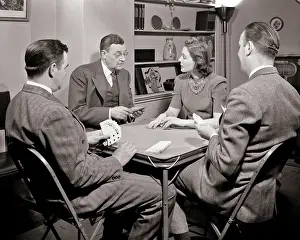 Domicile: Three Men and One Woman Seated at Table Playing